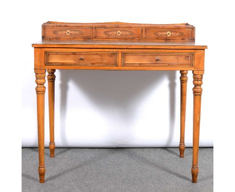 Reproduction yew wood writing table, with marquetry decoration, the inverted bow suprastructure with three small drawers, too