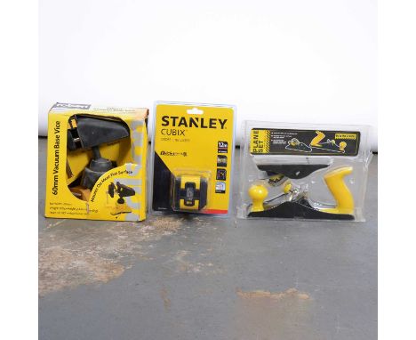 A box of various hand tools including a Stanley Cubix cross line laser, planes, vices etc,