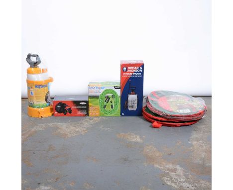 Various garden equipment, including a Spear and Jackson pressure sprayer and a Hoselock sprayer.