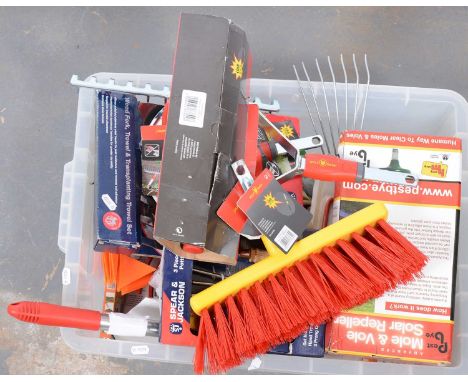 A box of Wolf Garden hand tools.