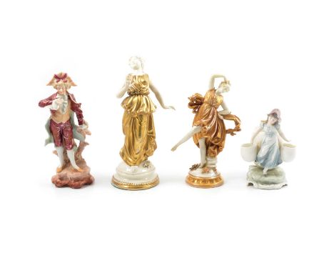 Collection of Continental and other porcelain and ceramic figurines, including German models of dancers with gilt dresses, sp