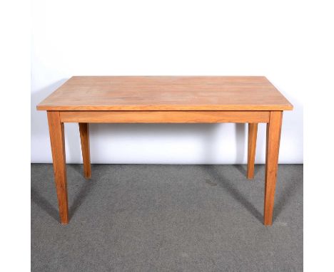 Modern light oak kitchen table, rectangular top 137x77cm, square tapering legs, height 77cm.