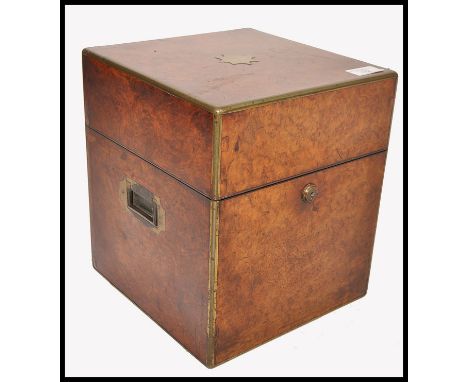 A 19th century George III burr walnut campaign tantalus - travelling decanter box. Brass bound with Bramah lock and escutcheo