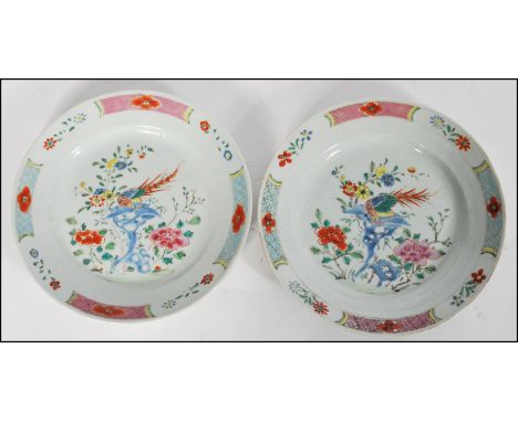 A pair of 17th / 18th century period Chinese Famille Rose / Verte plates - Kangxi period (1662-1722) Each painted to the well