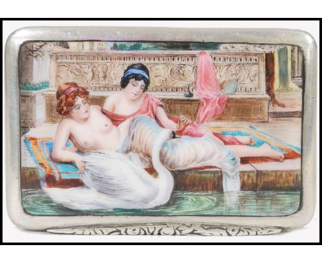A 19th century enamel top pictorial silver ( tested ) snuff box of rectangular form. The foliate thumb piece in front of erot