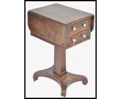 A late 18th century George III mahogany inlalid work box / side table raised on shaped quadruped base with central tapering b