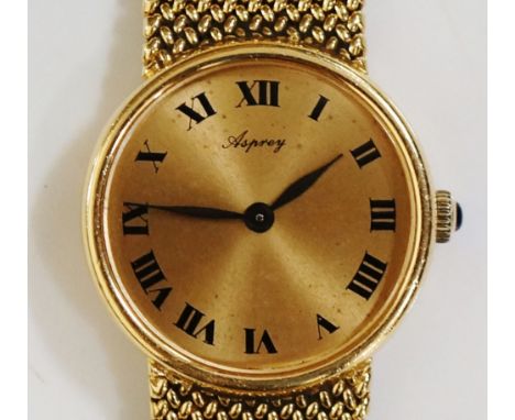 A ladies 18ct yellow gold wristwatch, the circular dial with gold face inscribed Asprey, Roman numerals, the crown with blue 