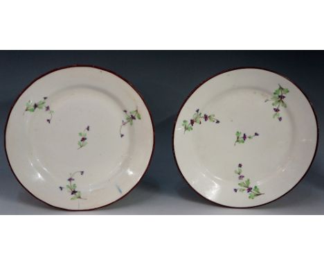 Pinxton - two pattern number 13 circular plates decorated with floral sprigs, manganese rims, 20.5cm and 19.7cm diameter (one