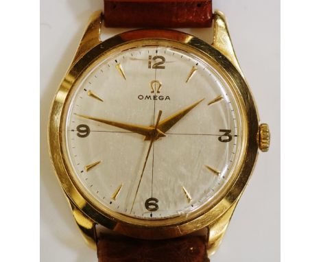 An 18ct yellow gold Omega gentleman's wristwatch, the champagne dial inscribed Omega, bar numerals with Arabic numerals at 12