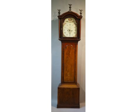 A George III mahogany longcase clock, the domed hood with cavetto moulded cornice, fitted ball and eagle finials to three flu