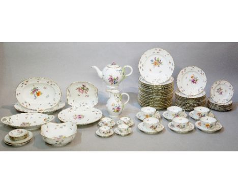 An extensive Schlaggenwald tea, coffee and dinner service, each piece painted in Meissen style to the spirally fluted bodies,