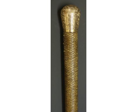 A late 19th / early 20th Century side saddle whip with gold coloured metal cap and collar, both elaborately engraved with scr