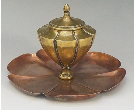 W. A. S. Benson - a model 553A inkwell, the copper petal shaped base with fluted brass conical well rising at the shoulder an