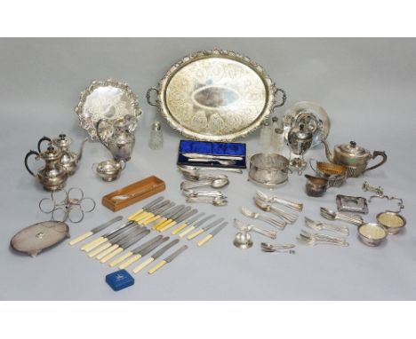 A quantity of silver plated ware to include: a large foliate engraved two handled serving tray, 69cm long; a gadrooned tea se