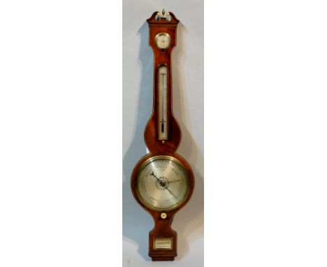 A George III mahogany wheel barometer with thermometer, outlined throughout with boxwood and ebony stringing, the swan neck p