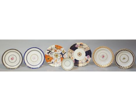 A Derby Prince of Wales pattern plate, the fluted border with apricot gilt rim, the centre painted with rose within gilt dot 
