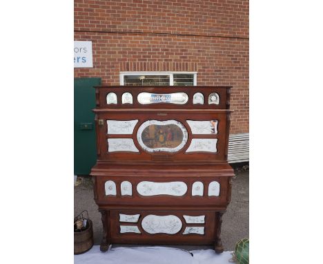 A late 19th / early 20th Century coin-in-the-slot barrel organ, contained within a walnut stained architectural case, stamped