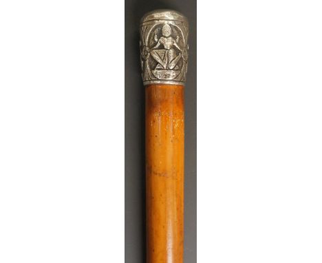 An Indian? walking stick, the silver knop chased and repoussé decorated with three dancers in traditional garb, line and flow