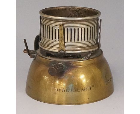 A "Sparkalight" lighter with brass reservoir, loop handle and milled sparking handle, pierced cowl, 6cm high, bearing patent 