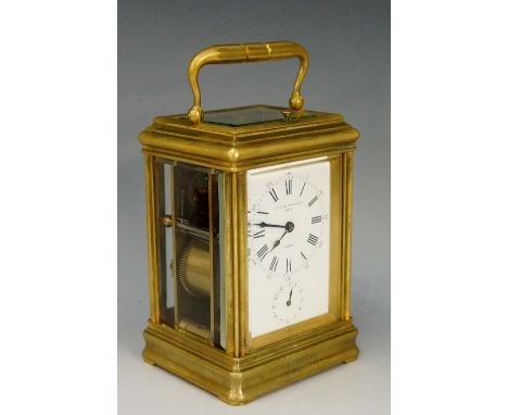 Charles Frodsham & Co. - a brass cased repeating carriage clock, the white face with chapter ring of Roman and Arabic numeral