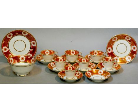 A Spode pattern 878 part tea service comprising: eight saucers, seven cups, basin and two dishes, each piece colourfully deco