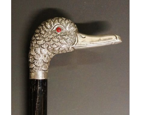 An Edwardian walking stick with silver handle cast and engraved as a duck's head, red glass eyes, indistinct maker's mark, Lo