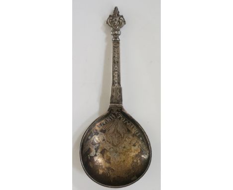 An unusual Norwegian silver folding spoon, cast scrolls and double headed terminal, the broad bowl engraved with 'Memento Mor