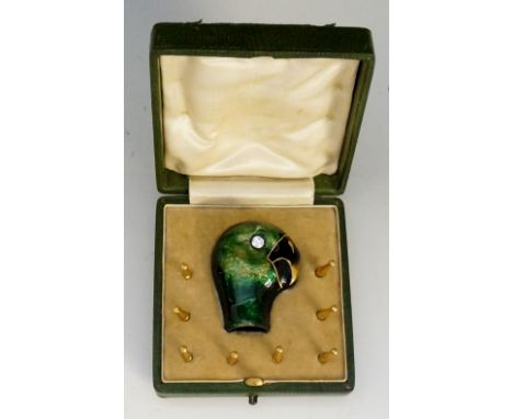 A fine enamel parasol handle terminal finely modelled as a parrot's head with bright green shaded feathered enamel head with 