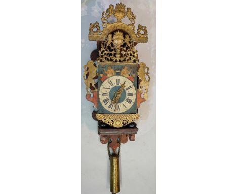 A late 18th Century Dutch polychrome decorated wall clock with gold painted metal cresting, vacant cartouche flanked by rampa