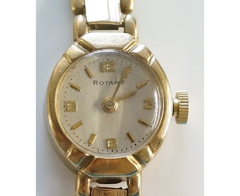 A ladies 9ct gold Rotary wristwatch, the champagne dial inscribed Rotary with Arabic numerals at 12,3,6 & 9, 9ct gold articul