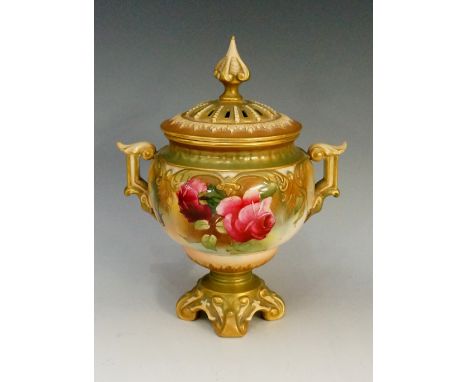 A Hadley's Worcester two handled pedestal vase and cover, the lid with bud finial, pierced and foliate decorated, the urnular