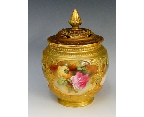 A Worcester porcelain globular vase and cover, the lid with foliate wrapped finial, pierced and leaf moulded borders, the bod
