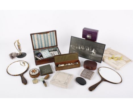 A collection of ladies vanity items, including: a dressing table hand mirrors, a photograph of Margot Fonteyn, an Art Deco pe