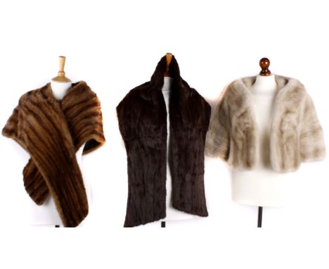 A National Fur Company pearl mink fur stole; together with a dark pastel mink fur wrap; and a Madame Cottrell fur stole, (3).