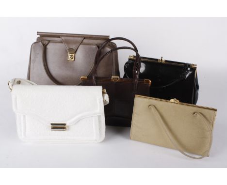 Five vintage handbags, comprising: an Elizabeth Arden beauty bag and lotion containers from the late 1950s, a reptile skin ha