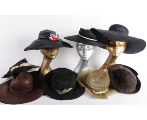 A group of ladies vintage straw hats, including: a wide-brimmed black straw hat by Edward Mann, a late 1940s Harrods hat, a c