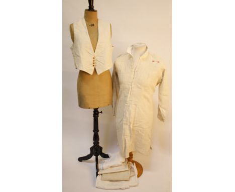 A Gieves heavy cotton formal/mess jacket, with a Clifton &amp; Sons white waistcoat, a pair of button-fly white cricket trous