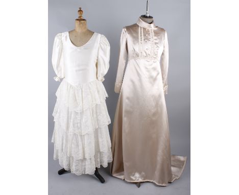 Six vintage wedding dresses, comprising: a cream 1960s wedding dress, a 1960s brocade wedding dress, a cream nylon and lace w