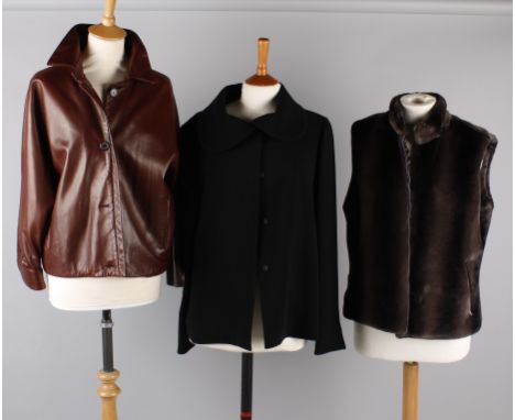 A Jil Sander brown soft leather cropped jacket; with a charcoal grey padded jacket, a silk-lined faux fur body warmer and a B