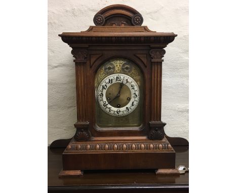 An early 20th Century oak cased bracket clock with Junghans movement.