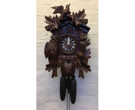 A late 20th Century Black Forest cuckoo wall clock.