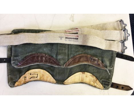 A lot to include; a French blue side cap with embroidered badge to front, marked to interior Le Mans 59, a laminated wooden p