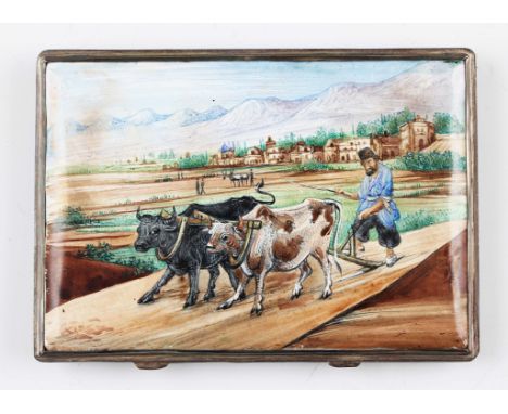 An enamelled cigarette case, the front depicting man ploughing field with cattle, reverse and interior enamelled with scrolli