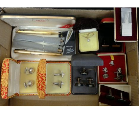 A lot to include Cross 14K gold filled pen and pencil set in fitted case, yellow metal propelling pencil, and another multi i