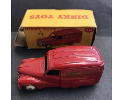 Dinky Toys Austin Van 'Nestles' Red Model 471. Played, worn, boxed. MU £100 Issued Oct 1955