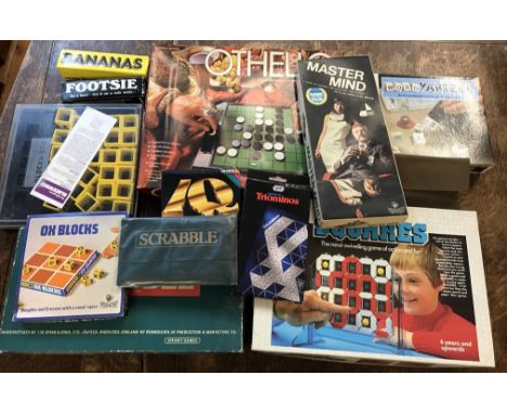 Toys and Games: A box of board games including vintage Othello, Ox Blocks, Master Mind, Word Yahtzee, Squares, Blockword, Tra