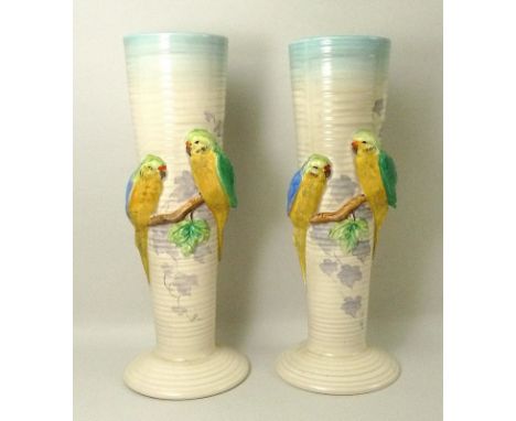 A pair of Clarice Cliff ceramic vases, mid 20th century, for Newport Pottery, of tapering cylindrical form, with spreading fo