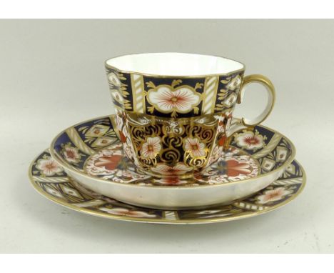 A Royal Crown Derby part tea service, in the Imari pattern, marked 2451, comprising six tea cups, five saucers, and six tea p