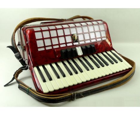 An Art Deco style Parrot piano accordion, cased.