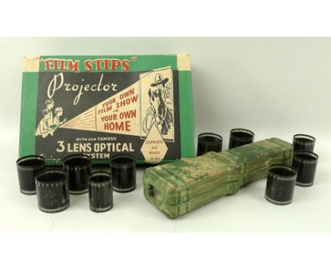 A vintage toy 'Film Stips', 35mm film projector with original box and film strips including Charlie Chaplin, Laurel and Hardy